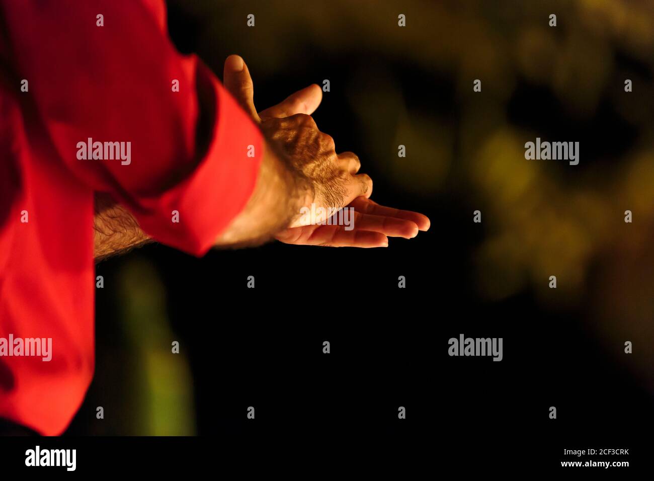 Close up of the clasped hands of a male flamenco dancer Stock Photo
