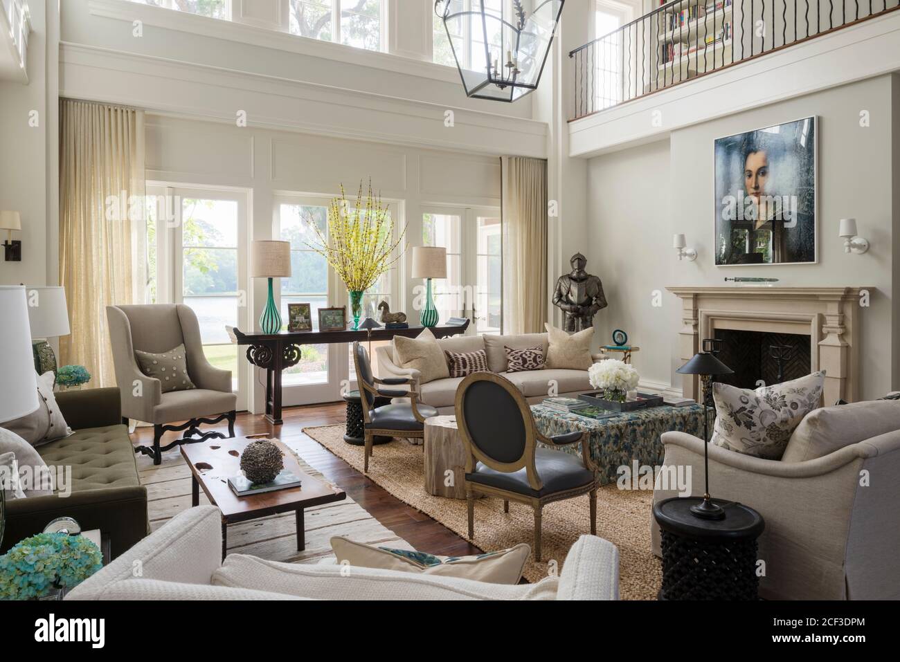 Country style living room with double height ceiling Stock Photo Alamy