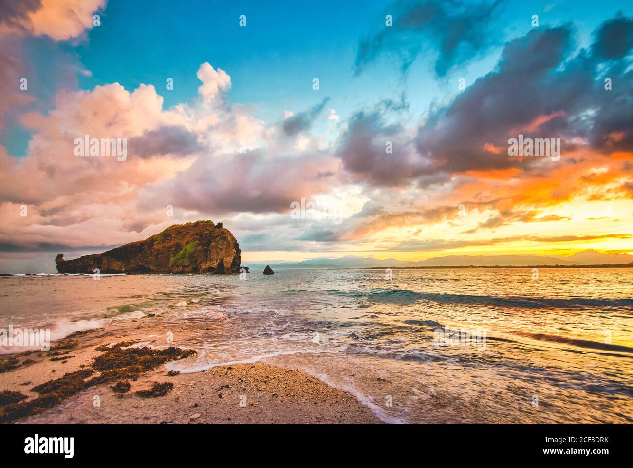Scenic sunrise at the shore of Zambales, Philippines. Stock Photo