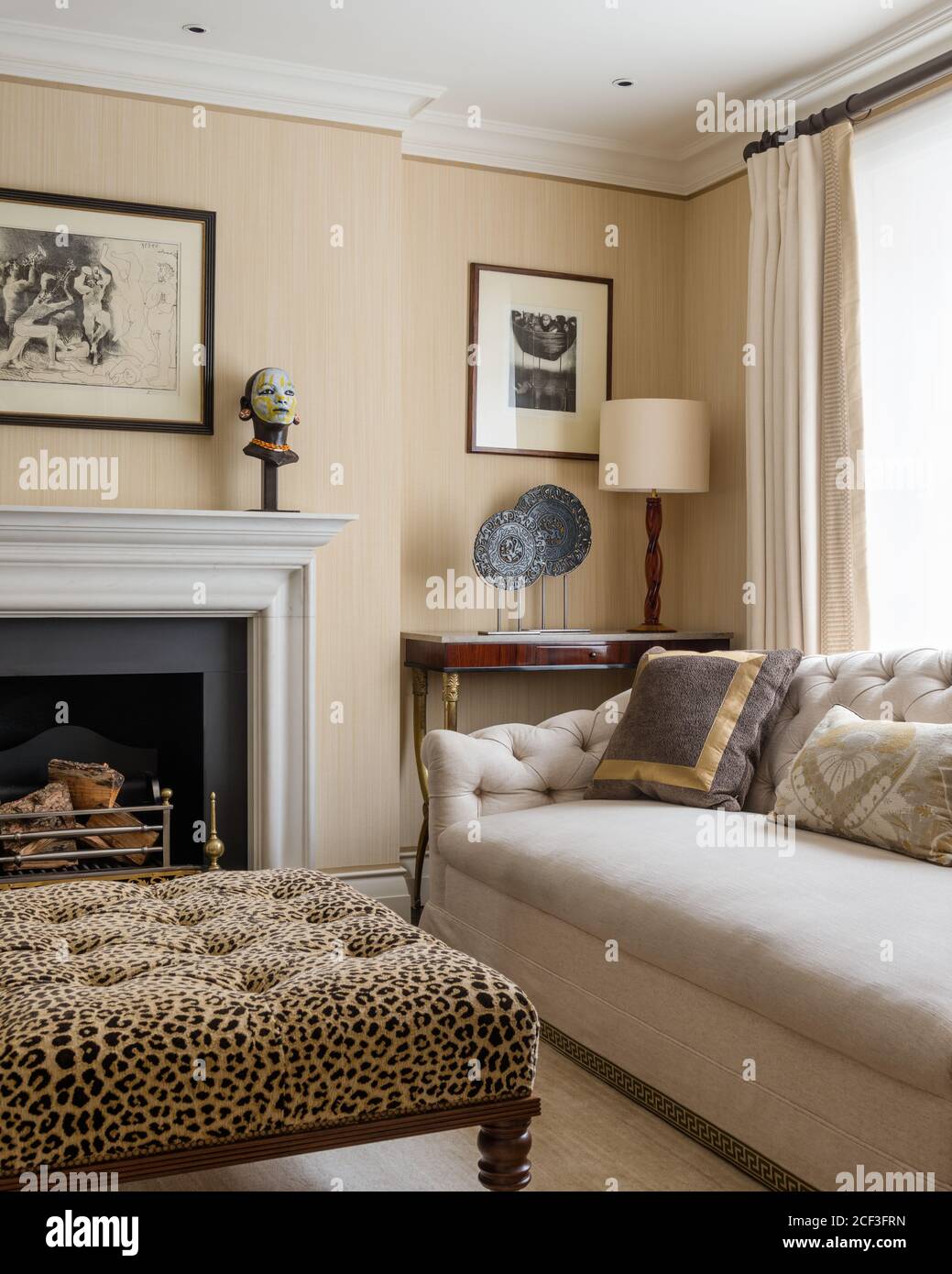 Country style living room with leopard print coffee table Stock Photo