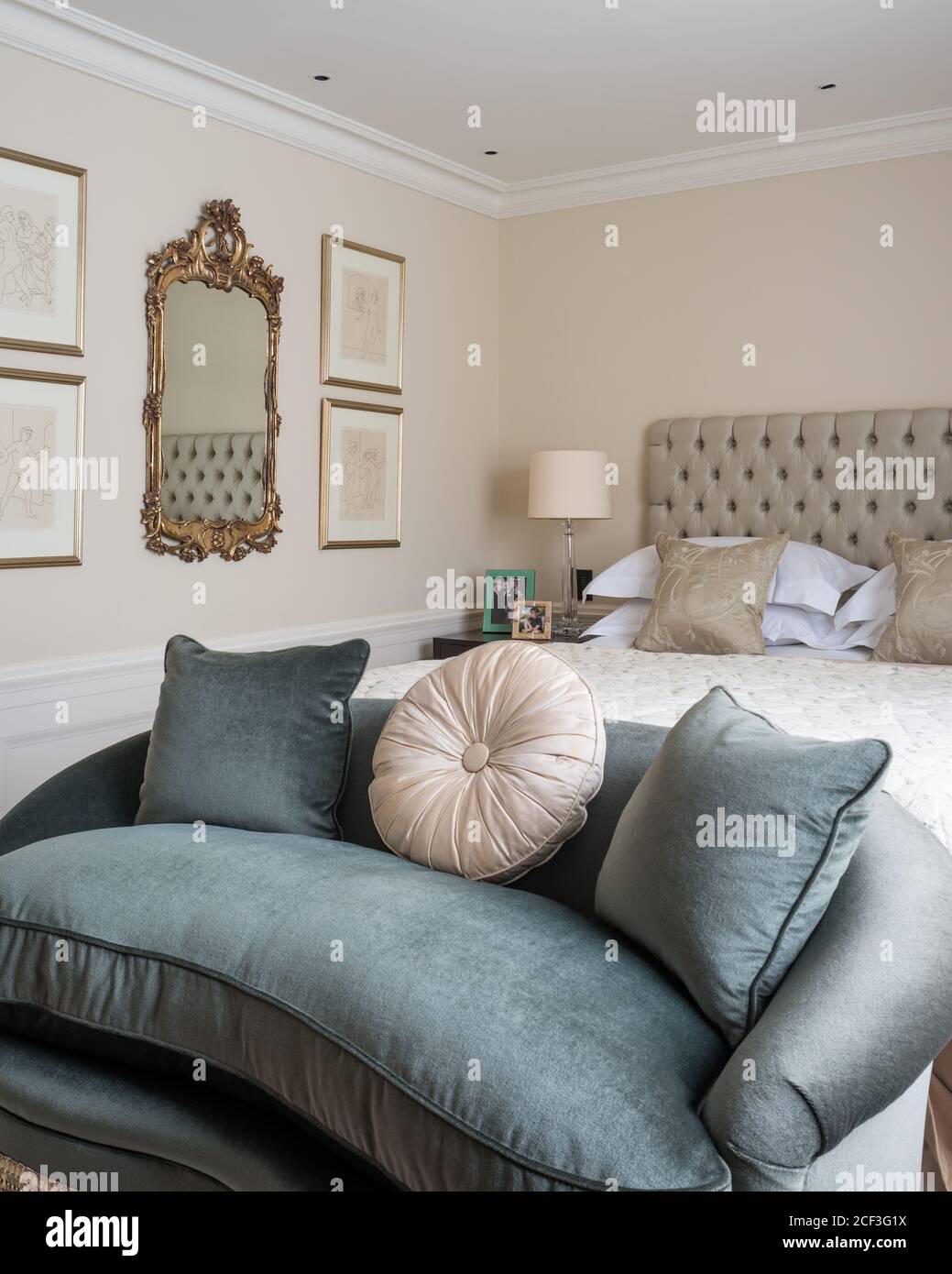 Sofa by bed in Georgian style bedroom Stock Photo - Alamy