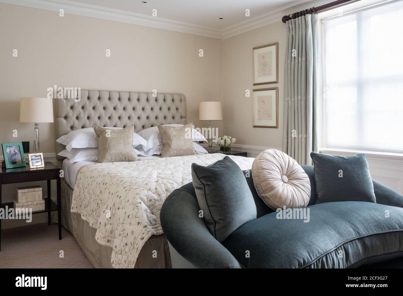 Sofa by bed in Georgian style bedroom Stock Photo - Alamy