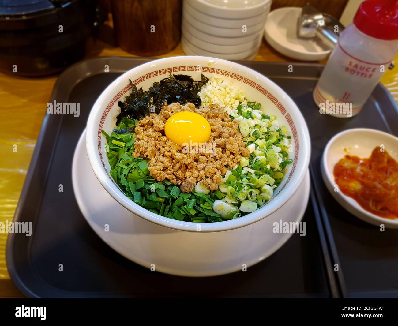 Mazesoba ramen, or Abura soba. Ramen and toppings served with oily soy