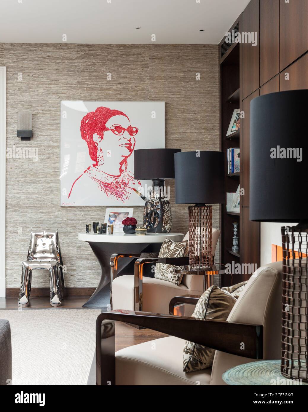 Painting of woman in modern living room Stock Photo - Alamy