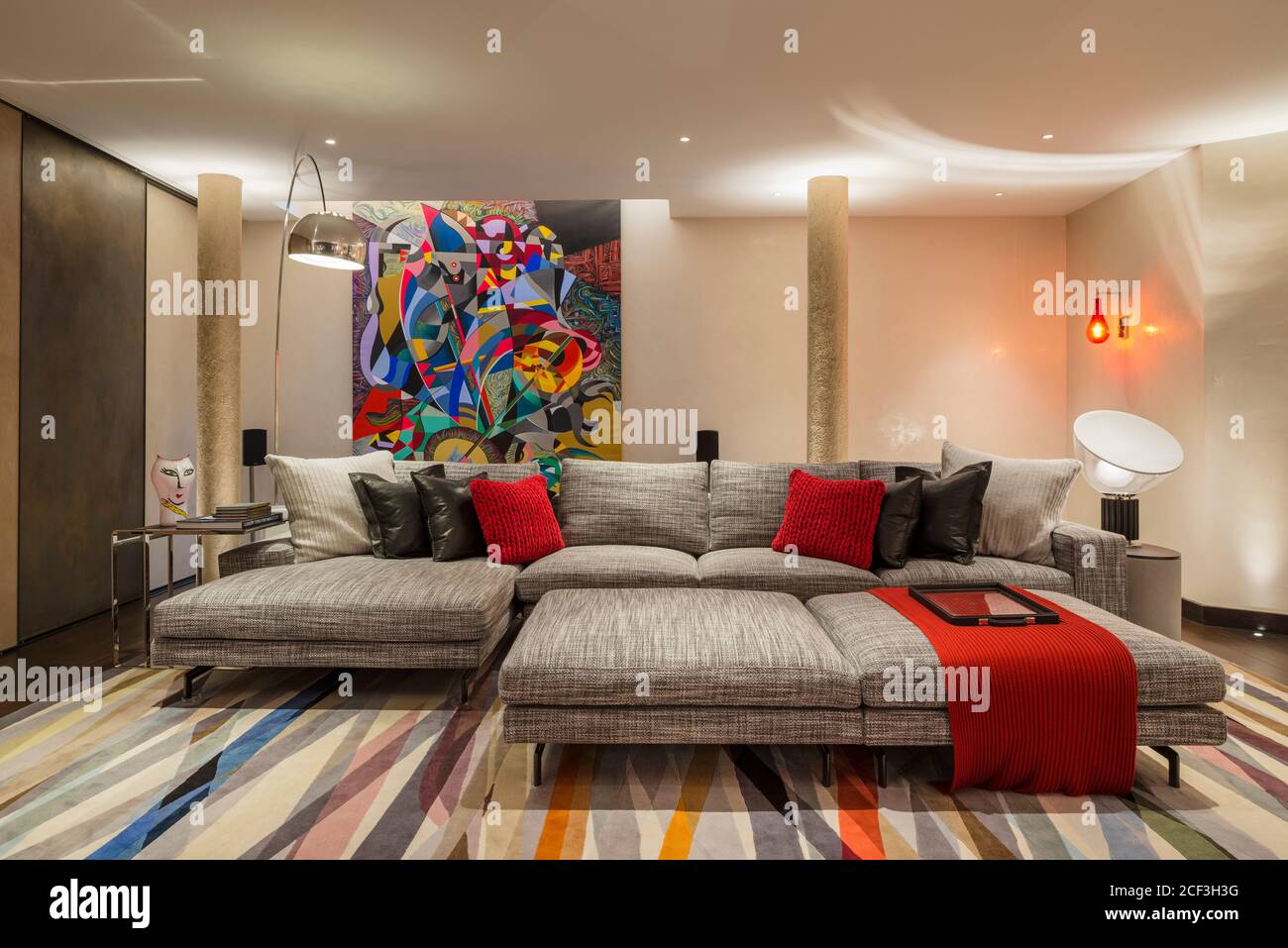 Modern living room with modern painting Stock Photo - Alamy