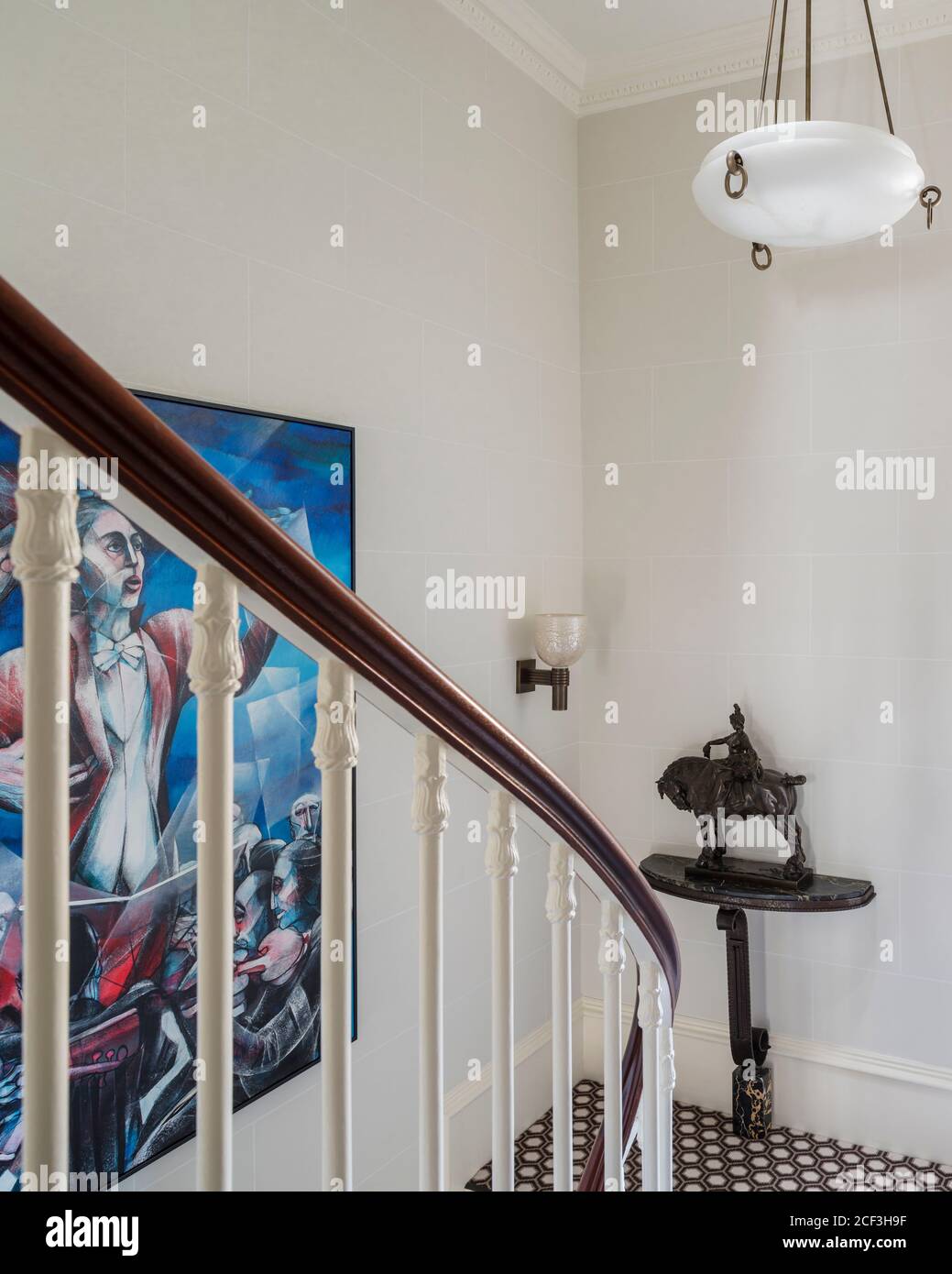Modern painting behind banister Stock Photo Alamy