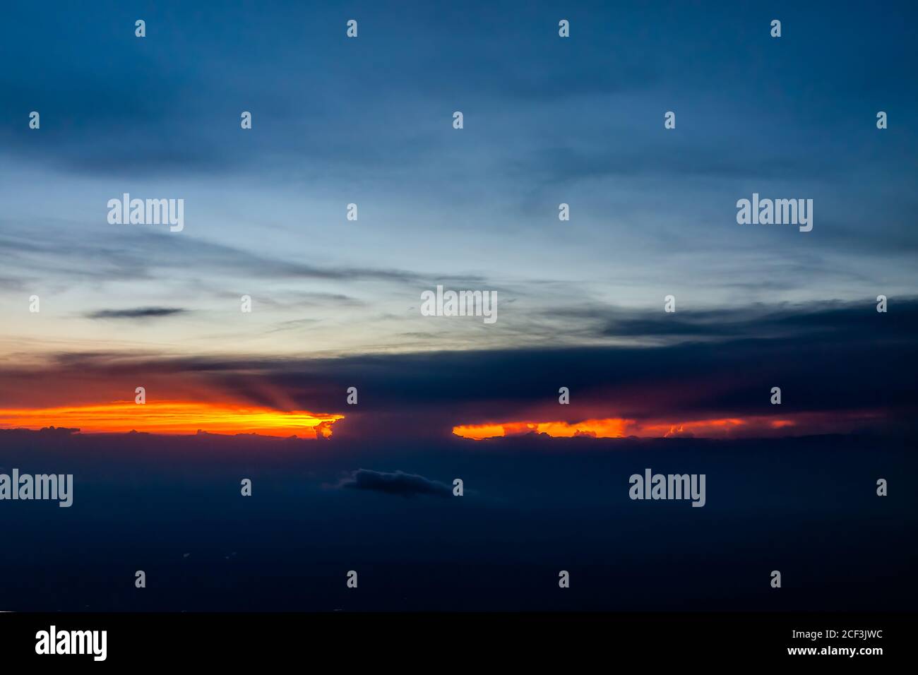 Colorful dramatic red dark sunset in Virginia horizon high angle aerial ...