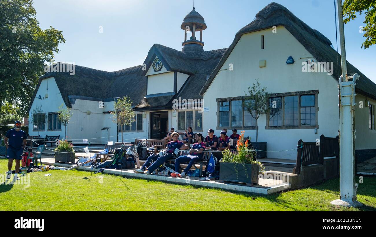 The pretty thatched cricket pavilion in Uppingham. Stock Photo