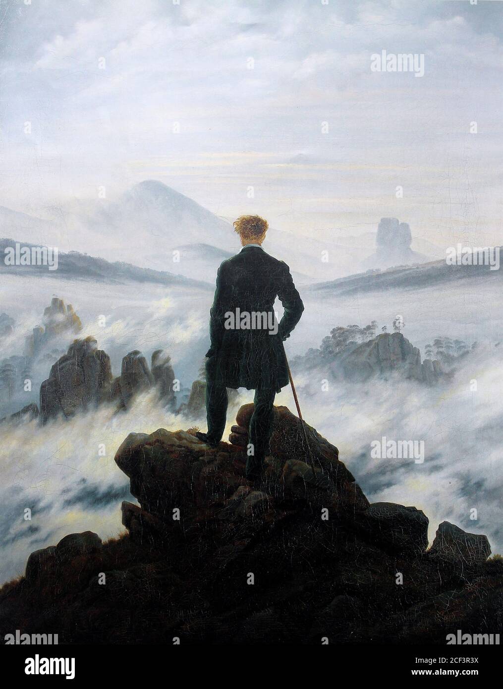 Caspar David Friedrich. Painting entitled “Wanderer above the Sea of Fog (Der Wanderer über dem Nebelmeer)“ by the German landscape artist, Caspar David Friedrich (1774-1840), oil on canvas, c.1817 Stock Photo