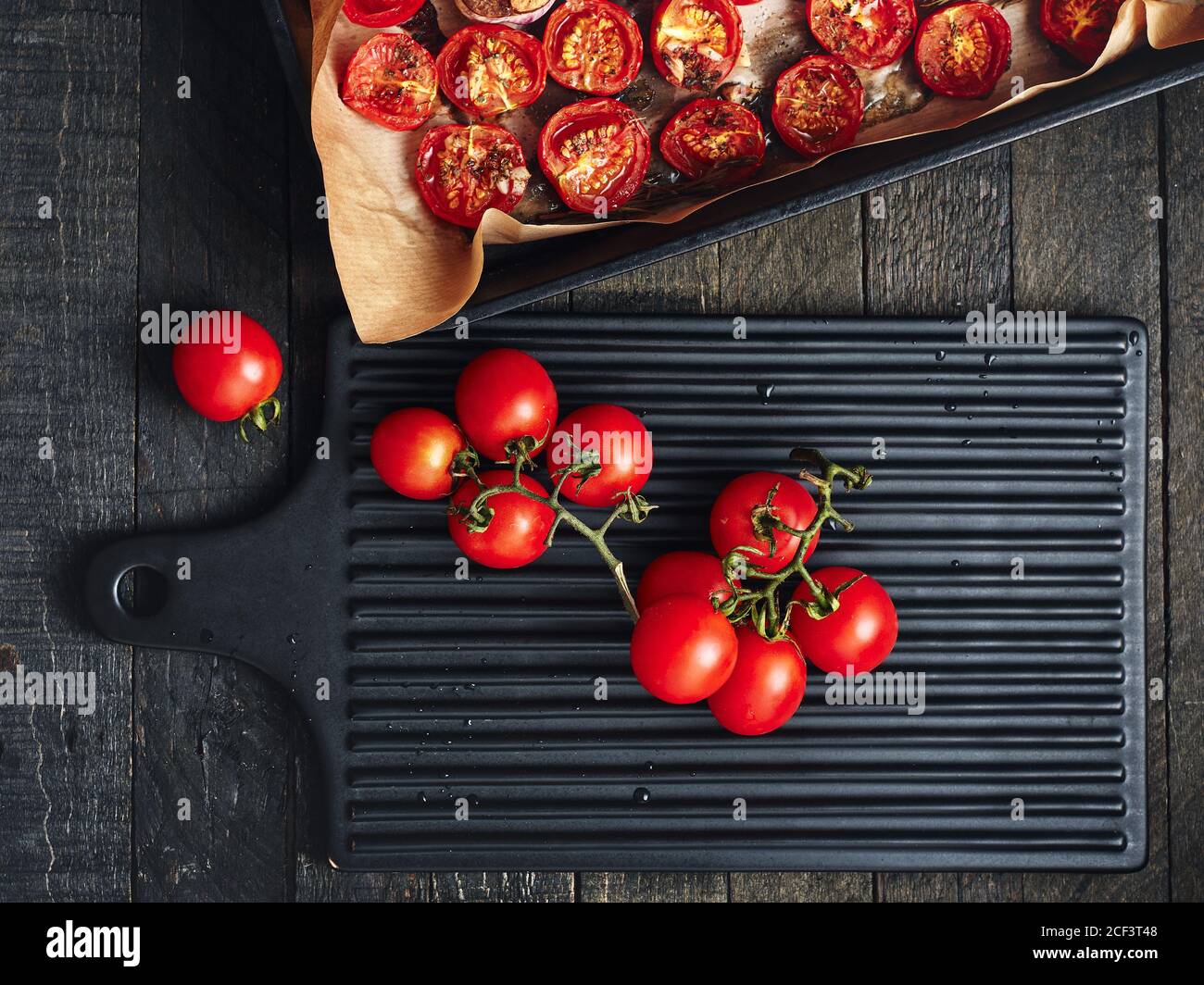 Fresh cherry tomatoes for baking in the oven. Stock Photo