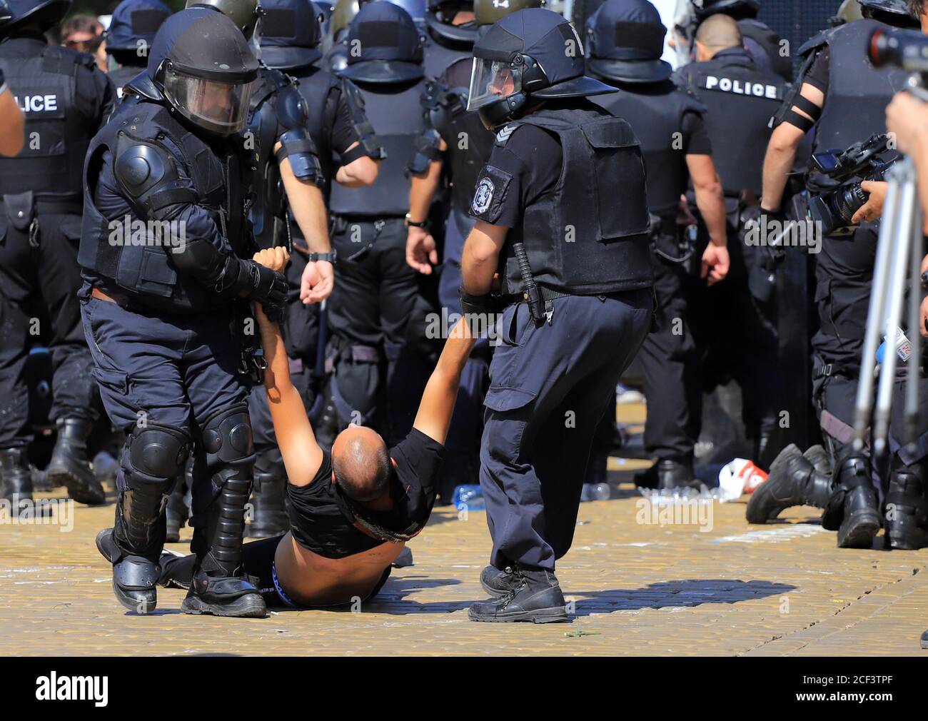 Sofia, Bulgaria on September 2, 2020: People protest against government in front of Parliament building (National Assembly), where drags and arrests b Stock Photo