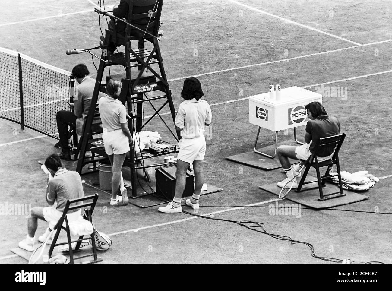 Jimmy Connors (USA) -R- during change over competing against Ken Rosewall (AUS)  in the Men's Final at the 1974 US Open Tennis. Stock Photo