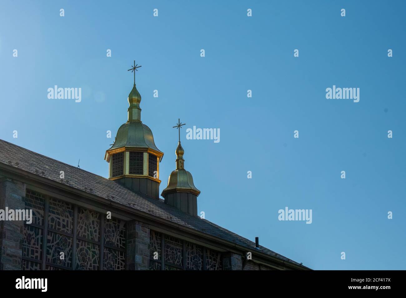 A Detailed Church Tower on a Clear Blue Sky Stock Photo - Alamy