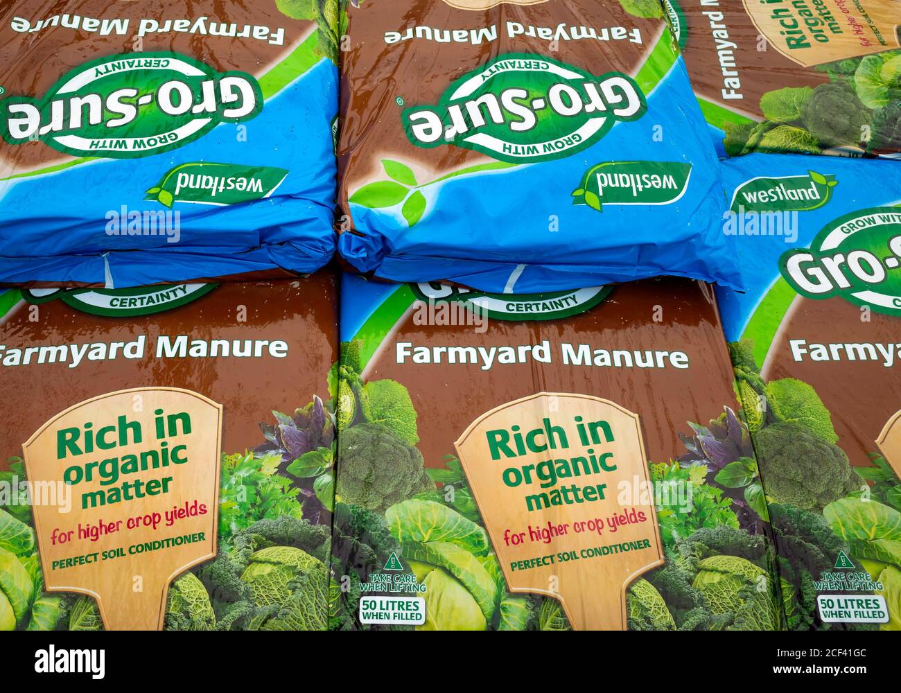 A stack of bags of Farmyard Manure improving soil quality and promoting