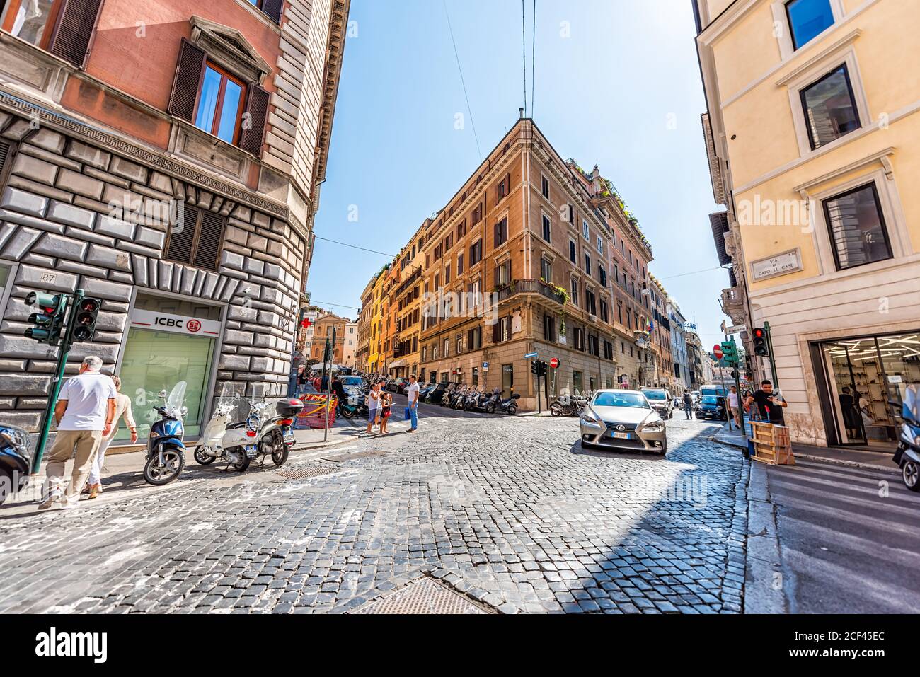 Rome, Italy - September 5, 2018: Italian street outside in historic city with people walking and ICBC sign and via de capo la case Stock Photo
