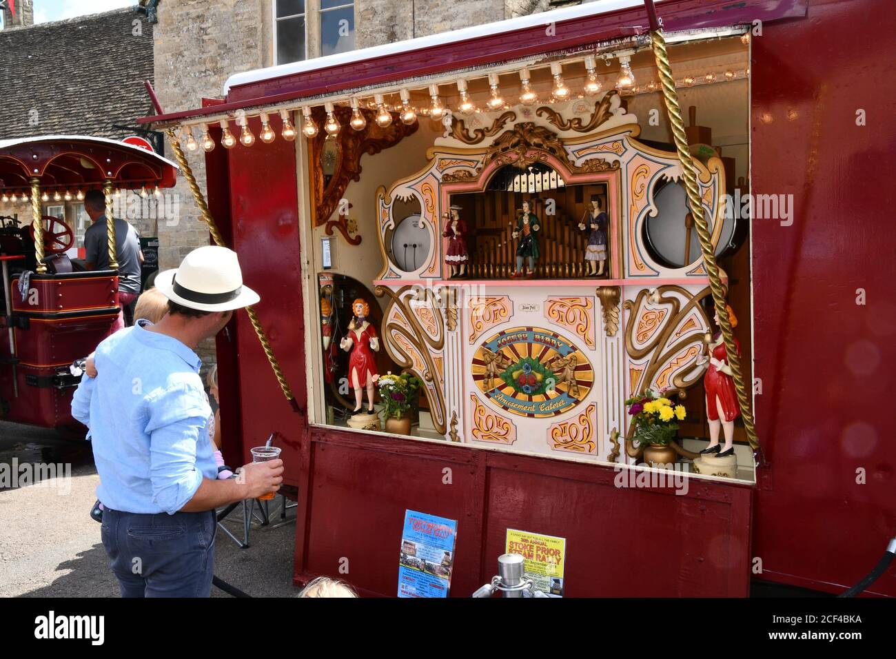 An elaborate Organ powered by a steam powered showmans engine at the annual International Boules Competition held in the wide high street of Sherston Stock Photo