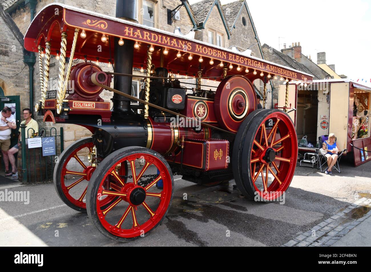 A steam powered showmans engine at the annual International Boules Competition held in the wide high street of Sherston , a village in Wiltshire, Engl Stock Photo