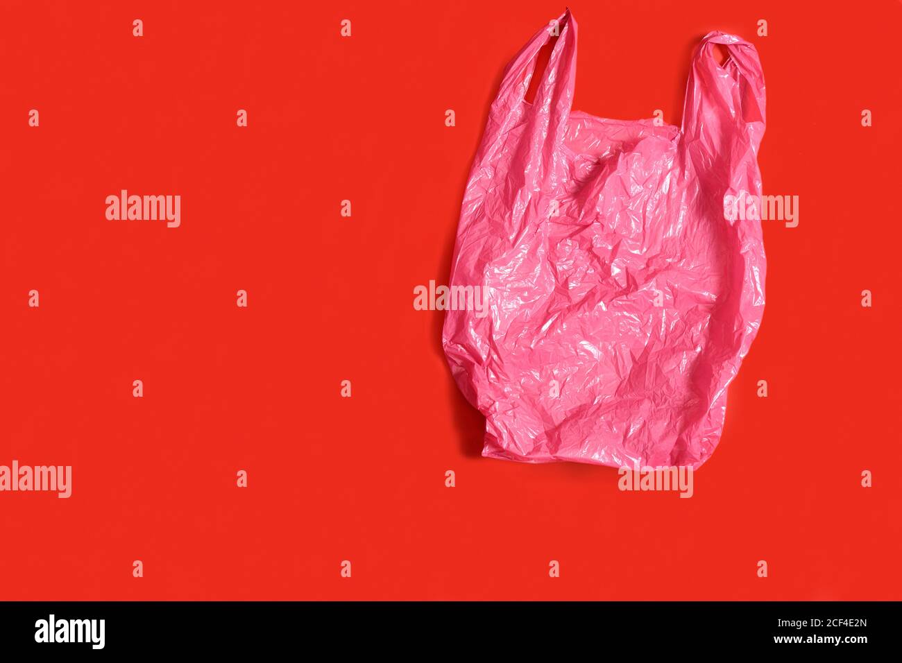plastic bag on red background Stock Photo
