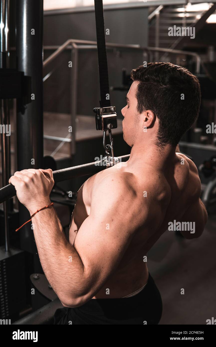 Young fitness man training in gym Stock Photo