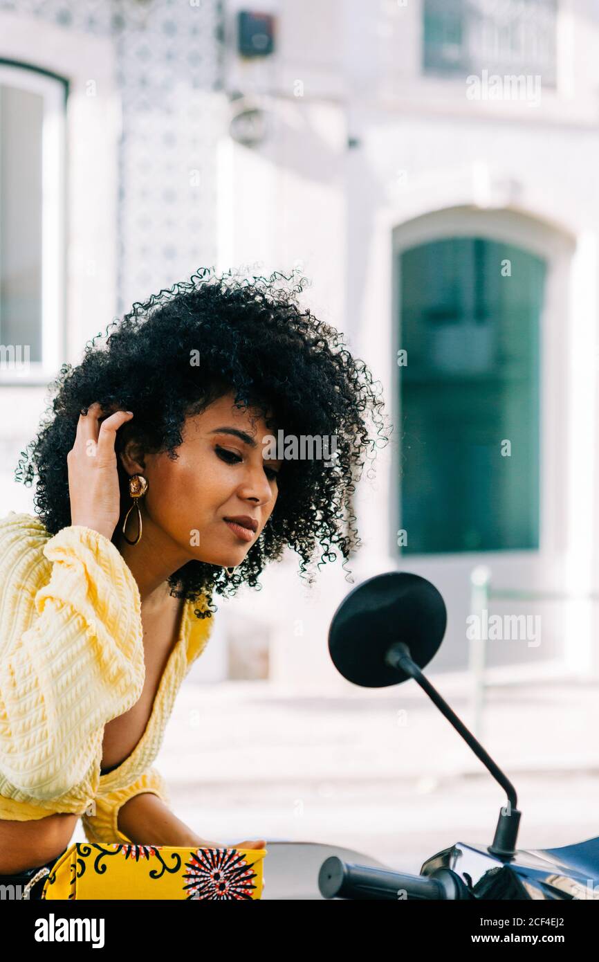 Curly black hair rear hi-res stock photography and images - Alamy