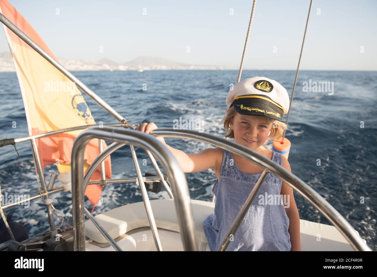 captain hat floating on expensive boat 