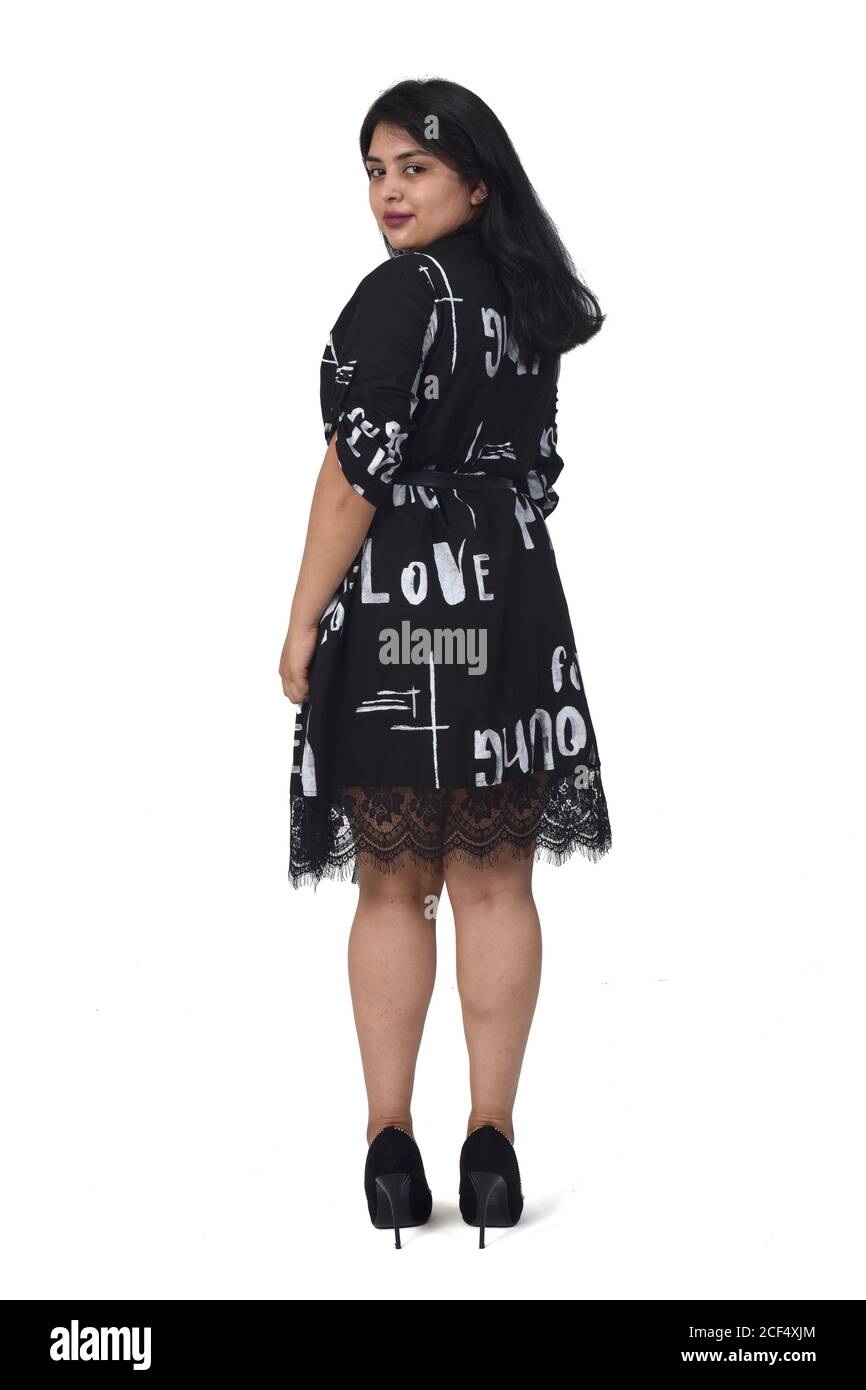 rear view of latin woman with dress and high heels on white background