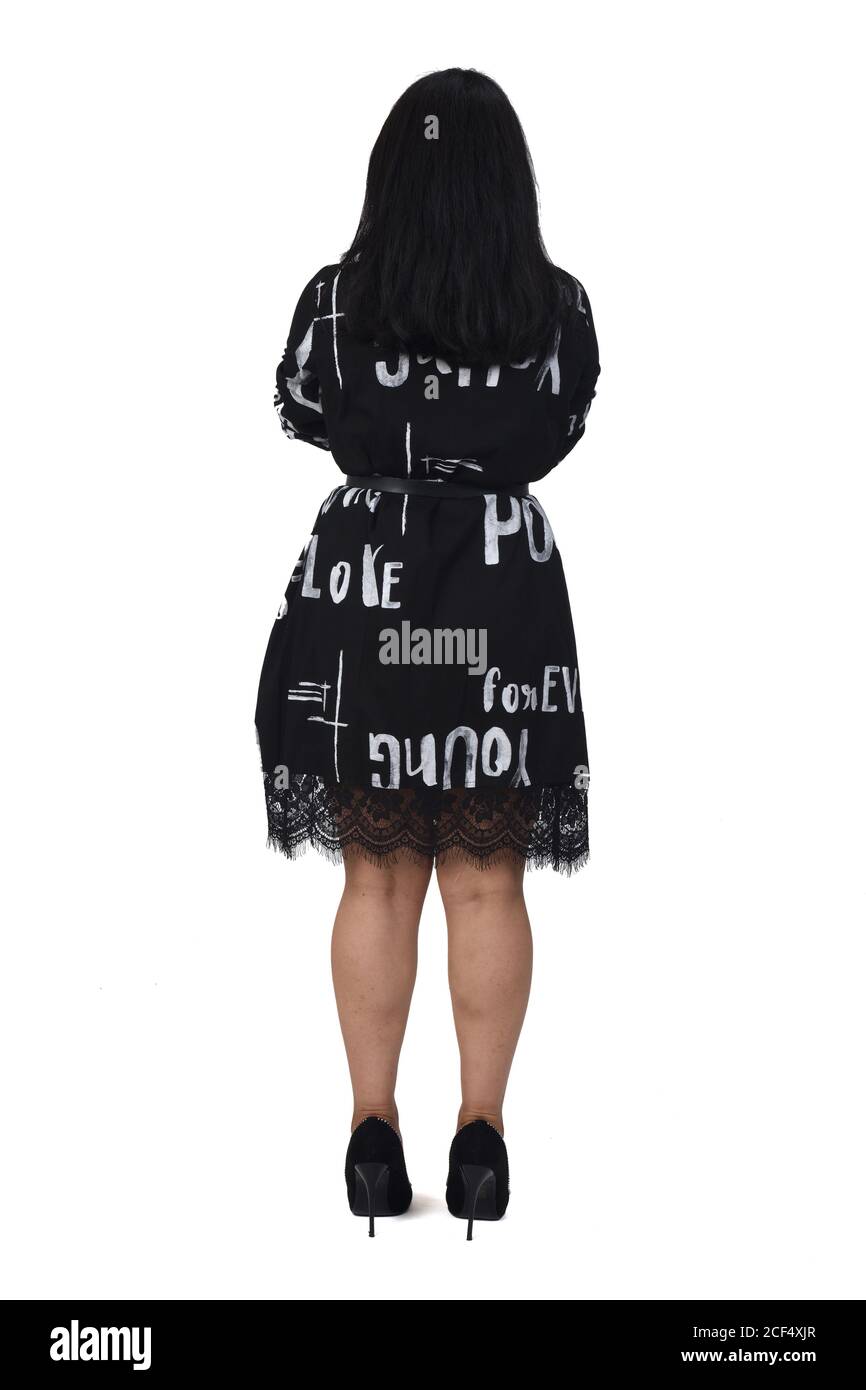 rear view of latin woman with dress and high heels on white background