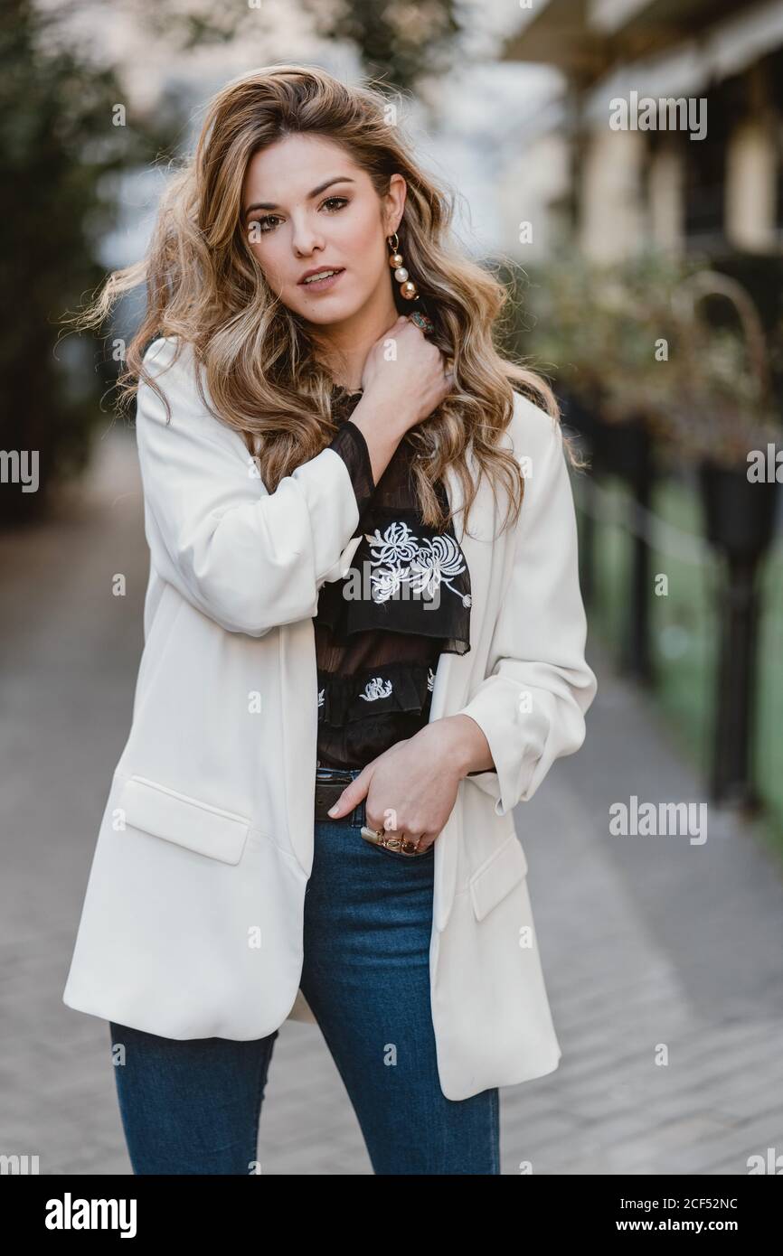Charming lady posing on street Stock Photo Alamy