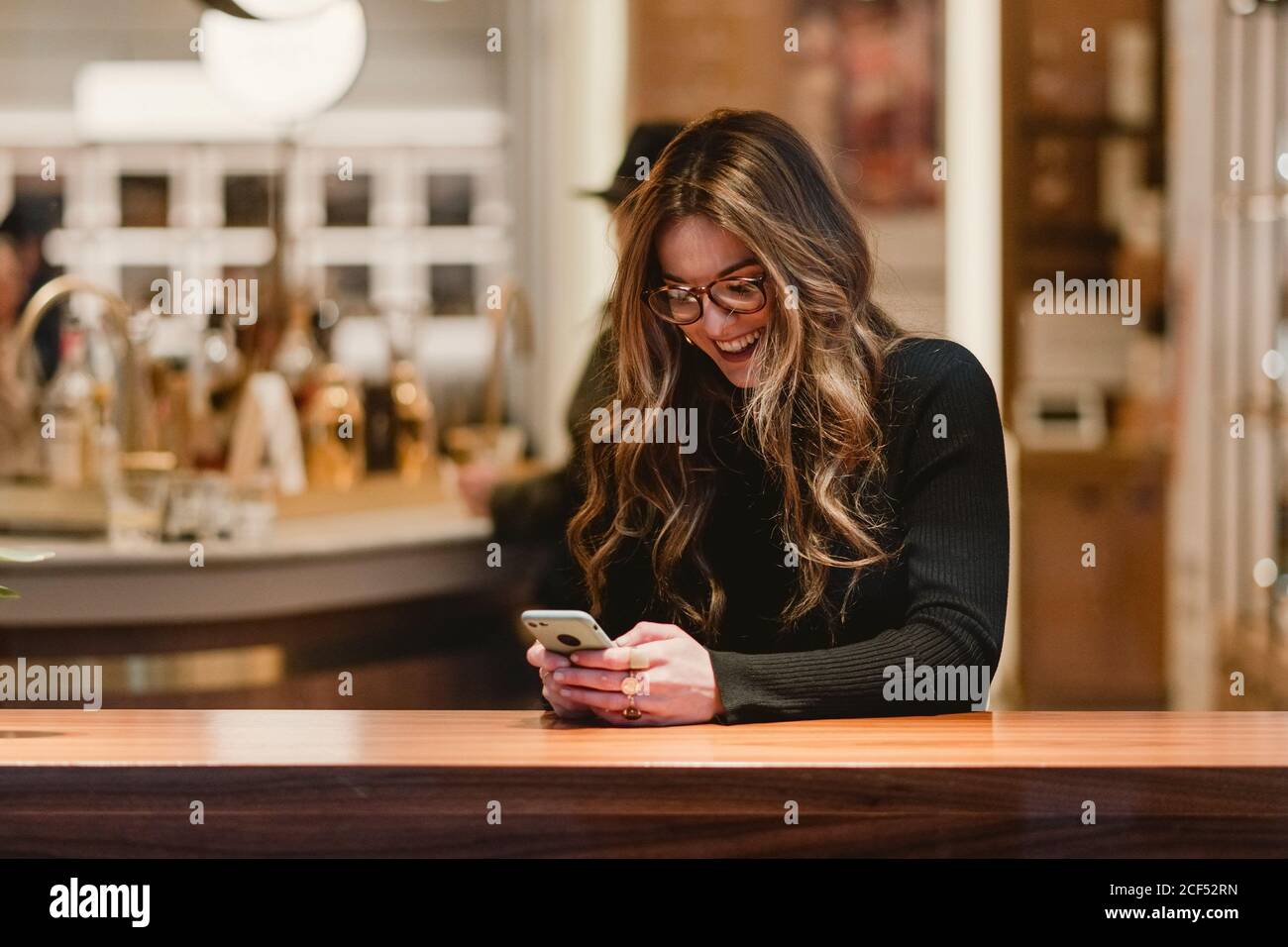 Female Using Iphone Female using smartphone hi-res stock photography and images - Alamy