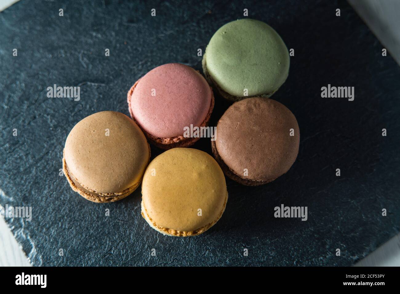 Fresh crunchy macaroons on table Stock Photo