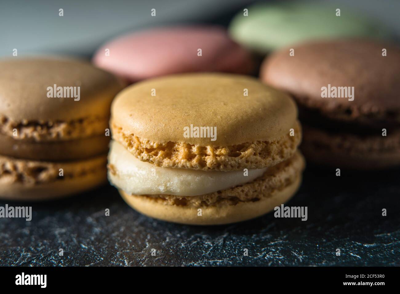 Fresh crunchy macaroons on table Stock Photo