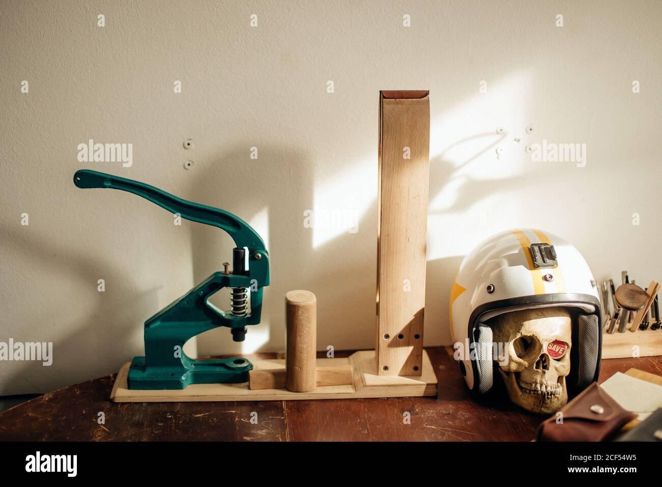 working with leather using crafting DIY tools Stock Photo