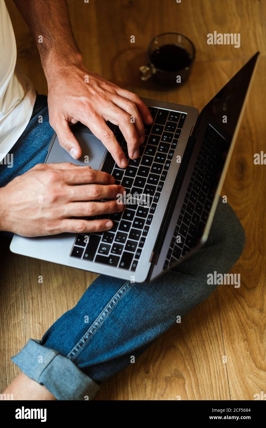 Bearded freelancer using laptop at home Stock Photo