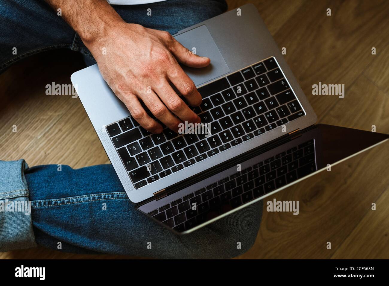 Freelancer using laptop at home Stock Photo