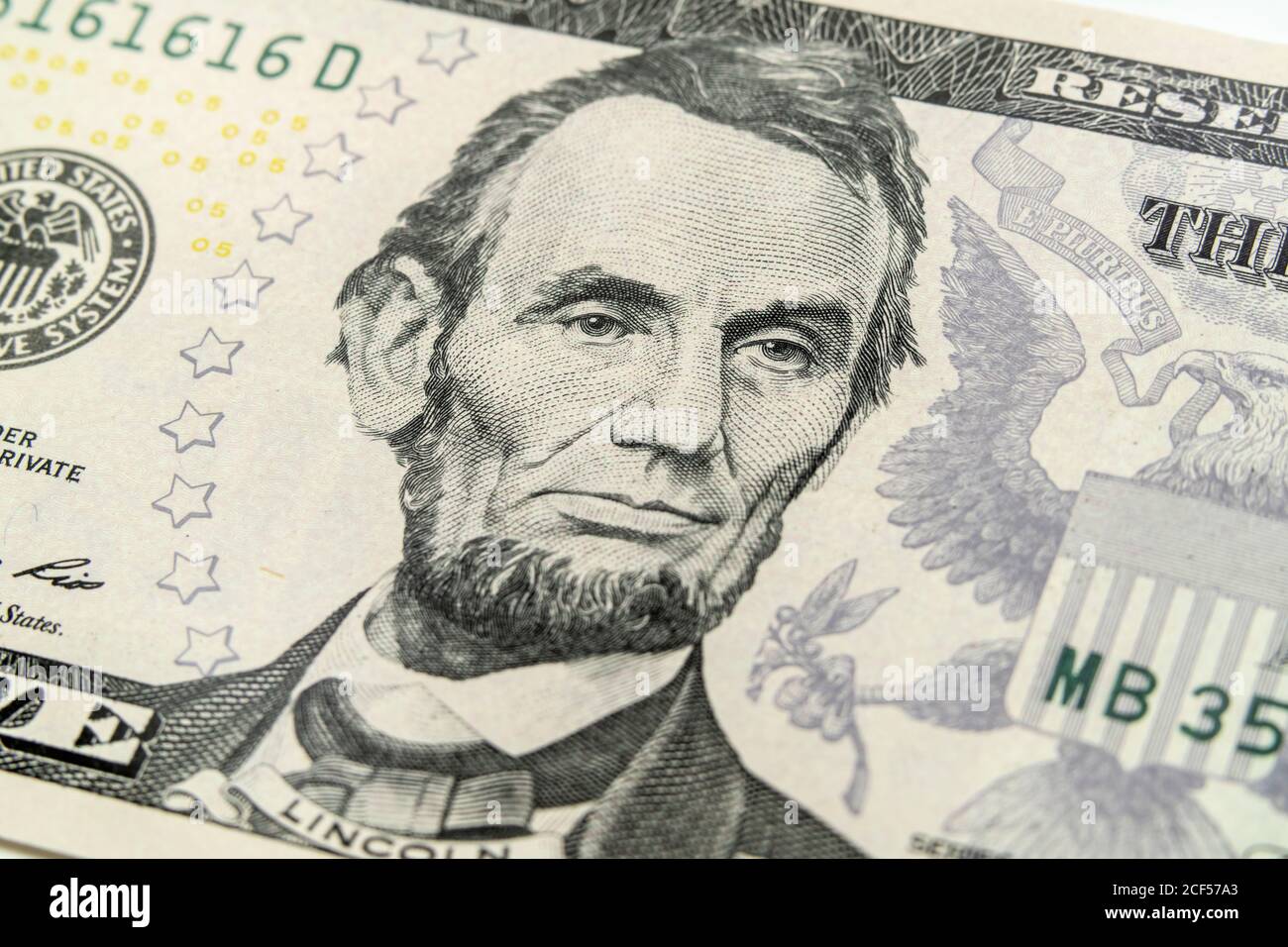 Macro view of Abraham Lincoln on the US five dollar bill. Stock Photo