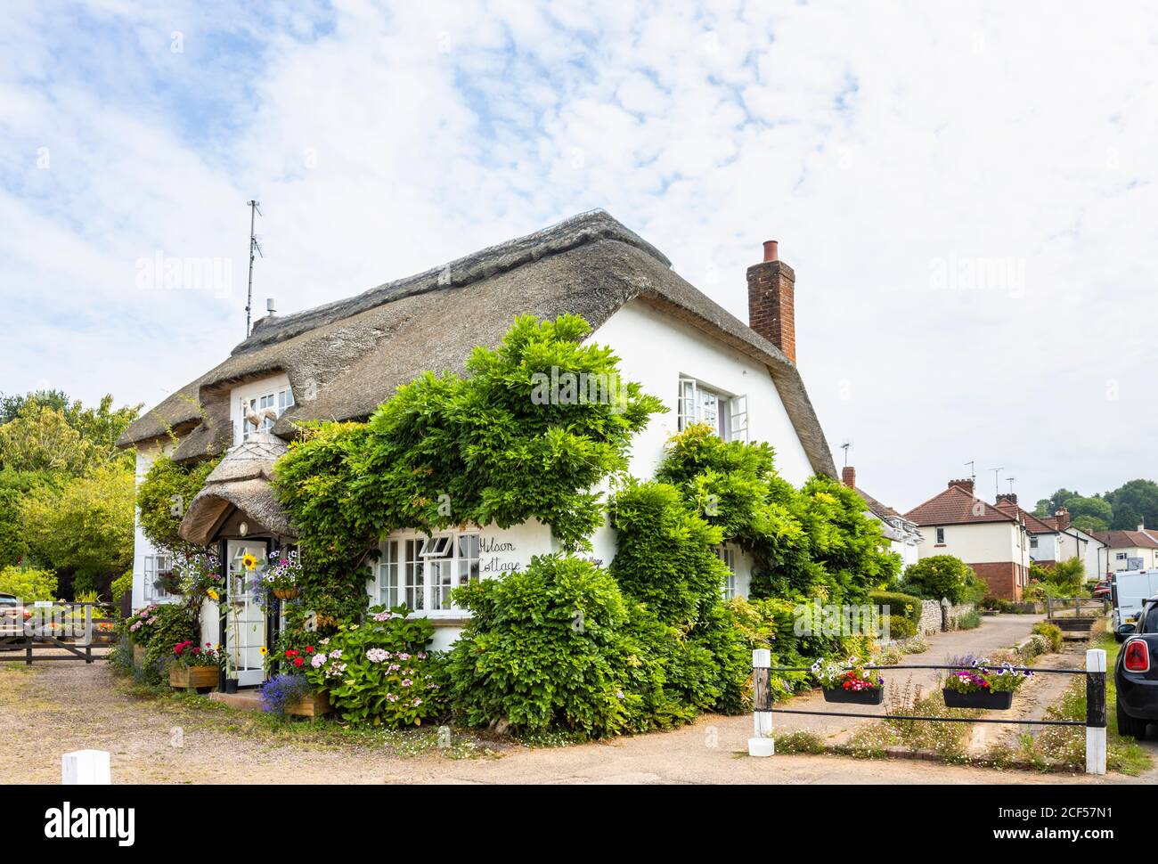 A pretty roadside thatched cottage at Otterton, a picturesque quaint