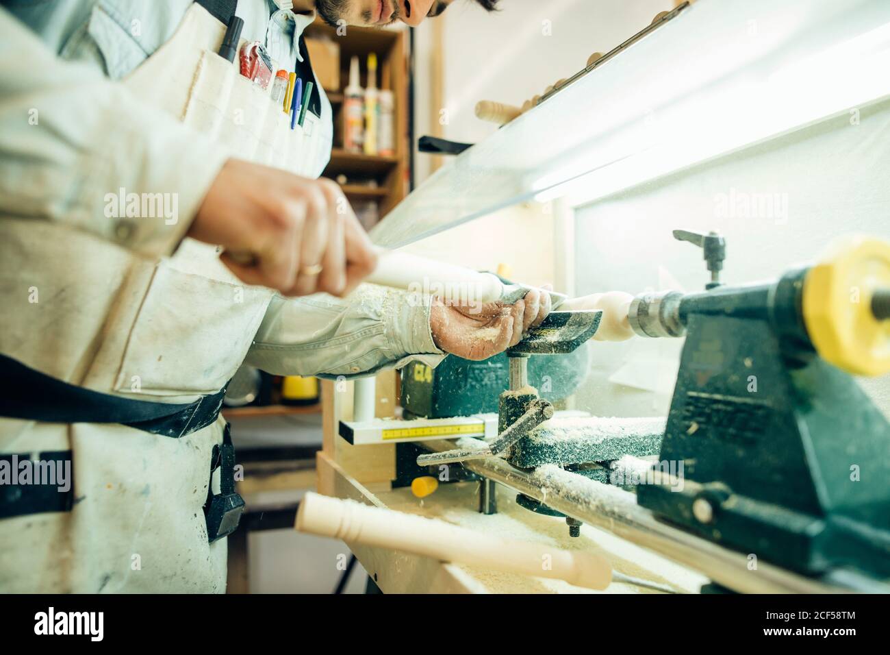 Wood turning on a lathe at a demonstration on Stock Photo Alamy