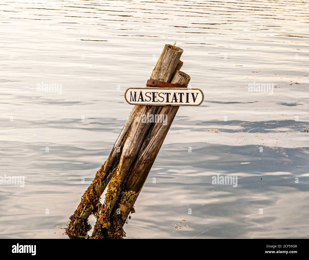 Bollard to which you can tie up ships. Masestativ: Mass Stand in the Harbor of Kristiansund, Norway Stock Photo