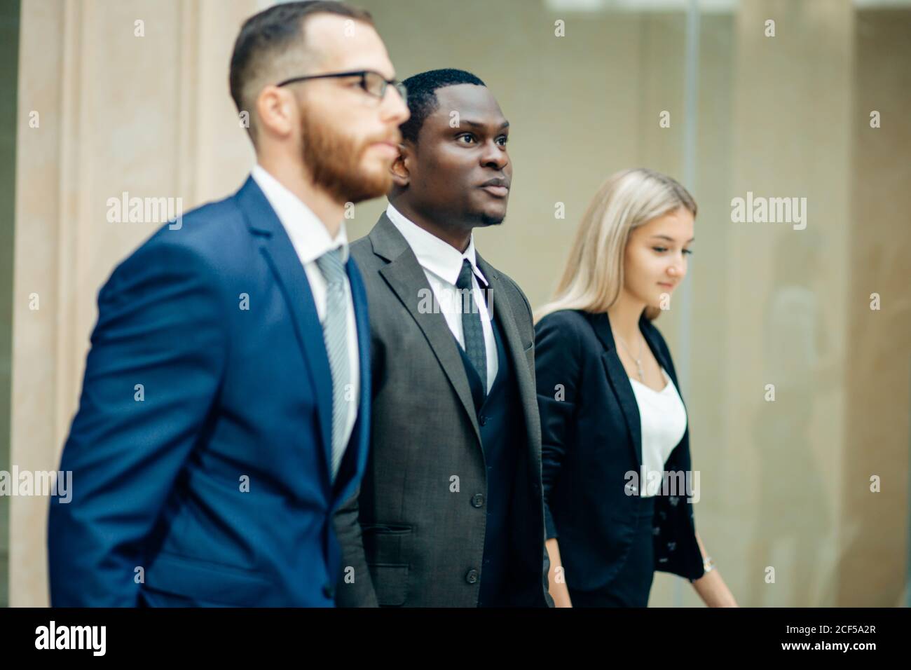 Business people walking and talking in the street Stock Photo - Alamy