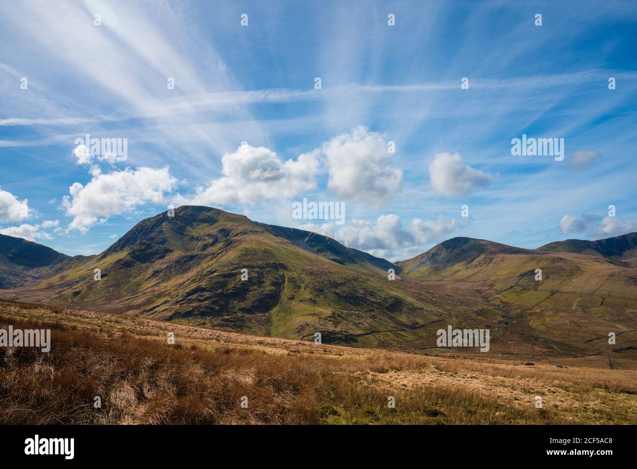 Colorful mountains in clouds hi-res stock photography and images - Alamy