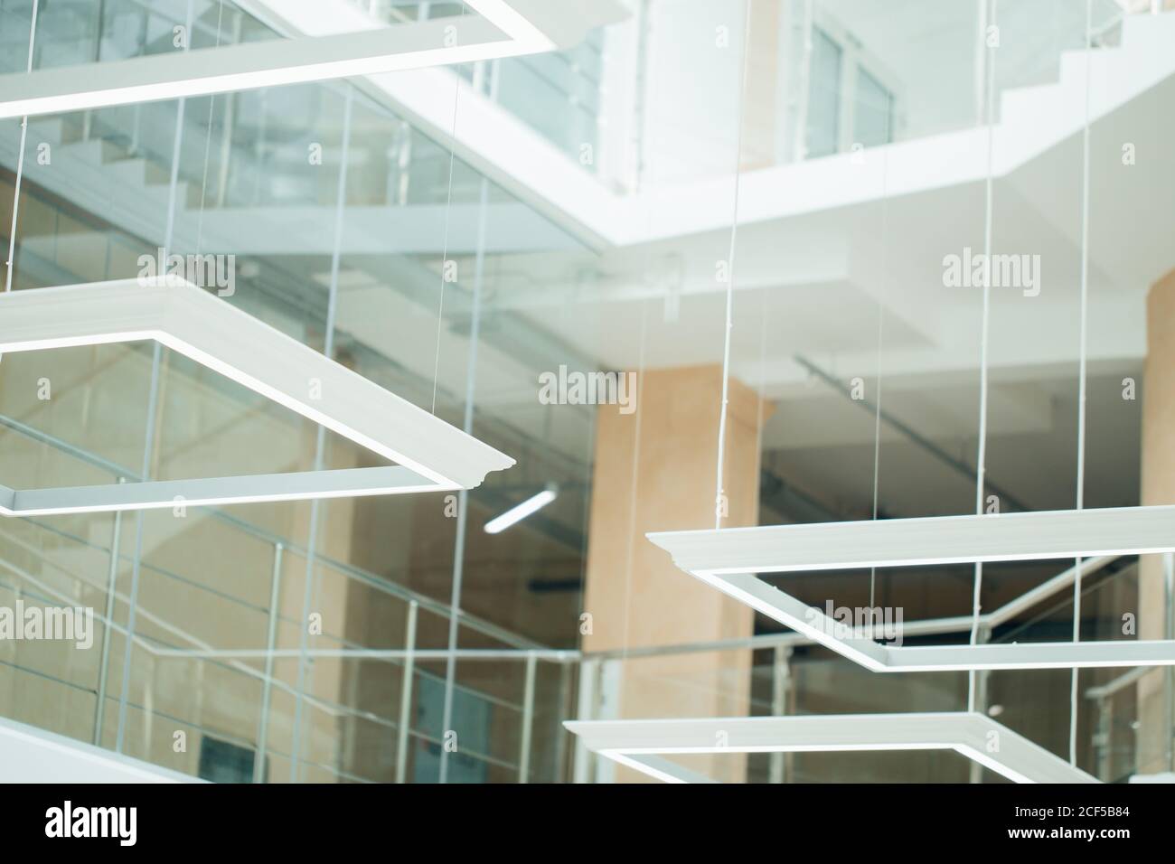 square ceiling lamp on the blue background. Stock Photo