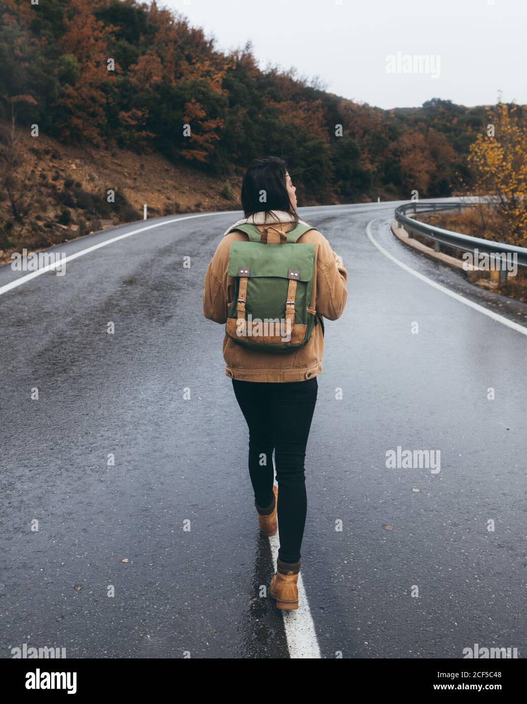 Female hiker walking on wet hi-res stock photography and images - Alamy