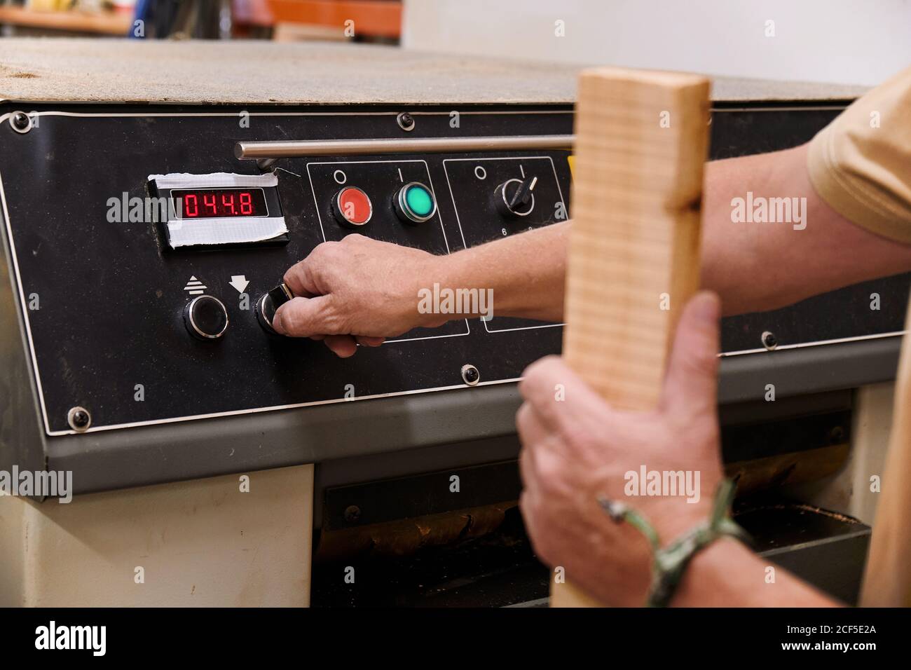 Metal tray with tasty pig shaped pastry placed on rack in professional ...