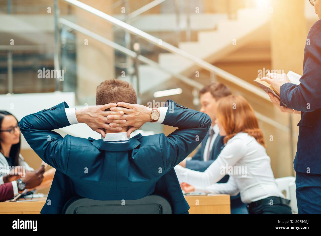 Young boss making great business discussion in modern coworking office ...