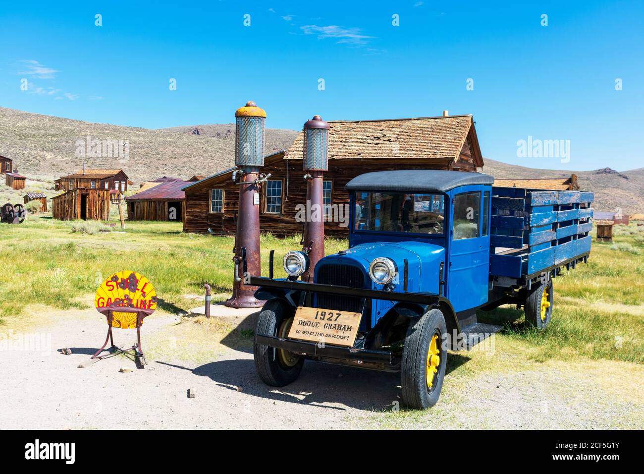 Blue Dodge Graham 1927 parked outdoor near vintage Shell gas station at Bodie State Historic Park - Bodie, California, USA - 2020 Stock Photo