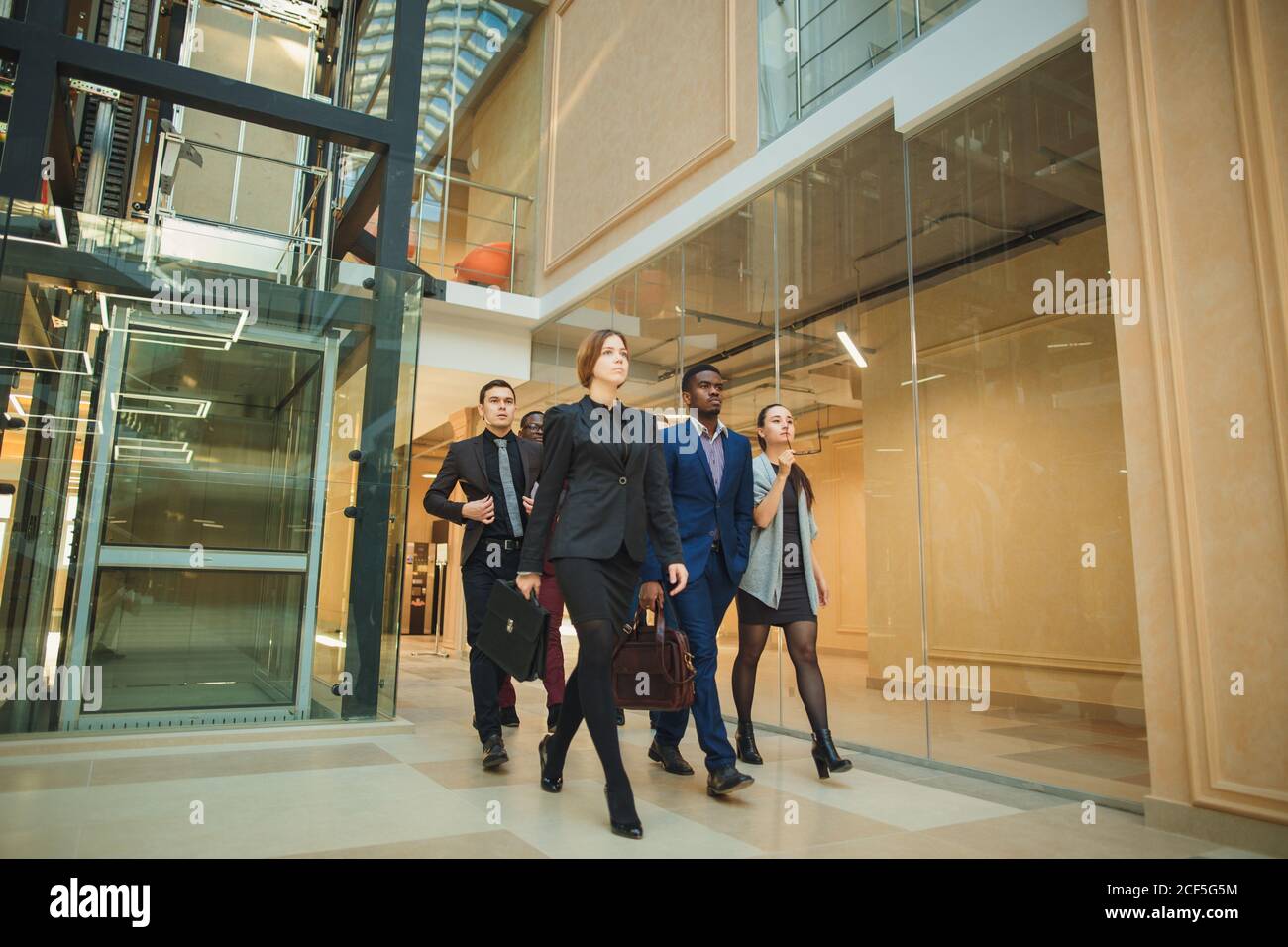 Business People Walking on a modern office Stock Photo