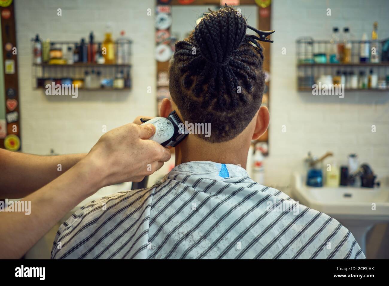 Back view african man doing hi-res stock photography and images - Alamy