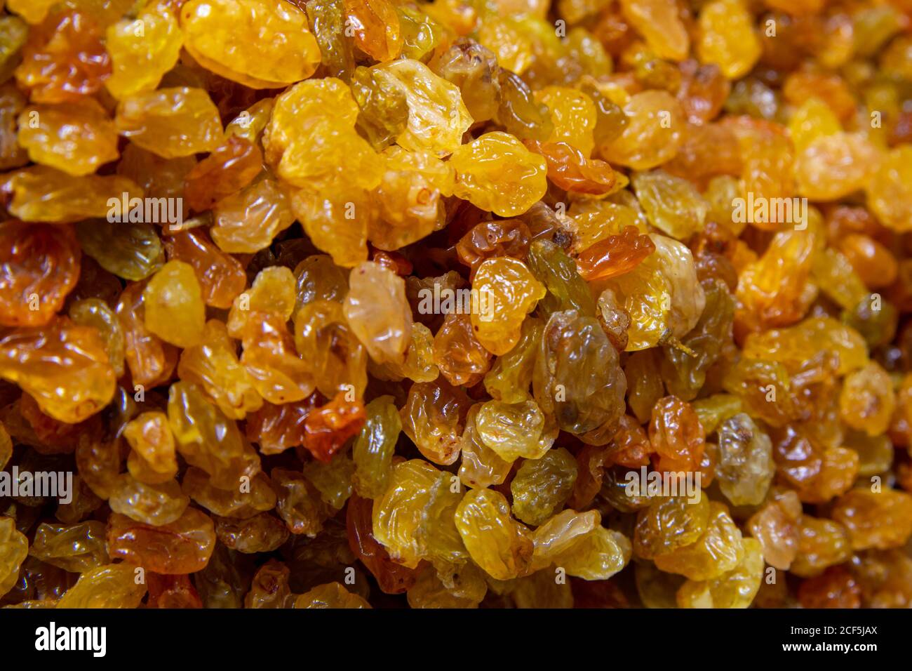 Background with golden raisins. Food texture. Top view, close-up Stock ...