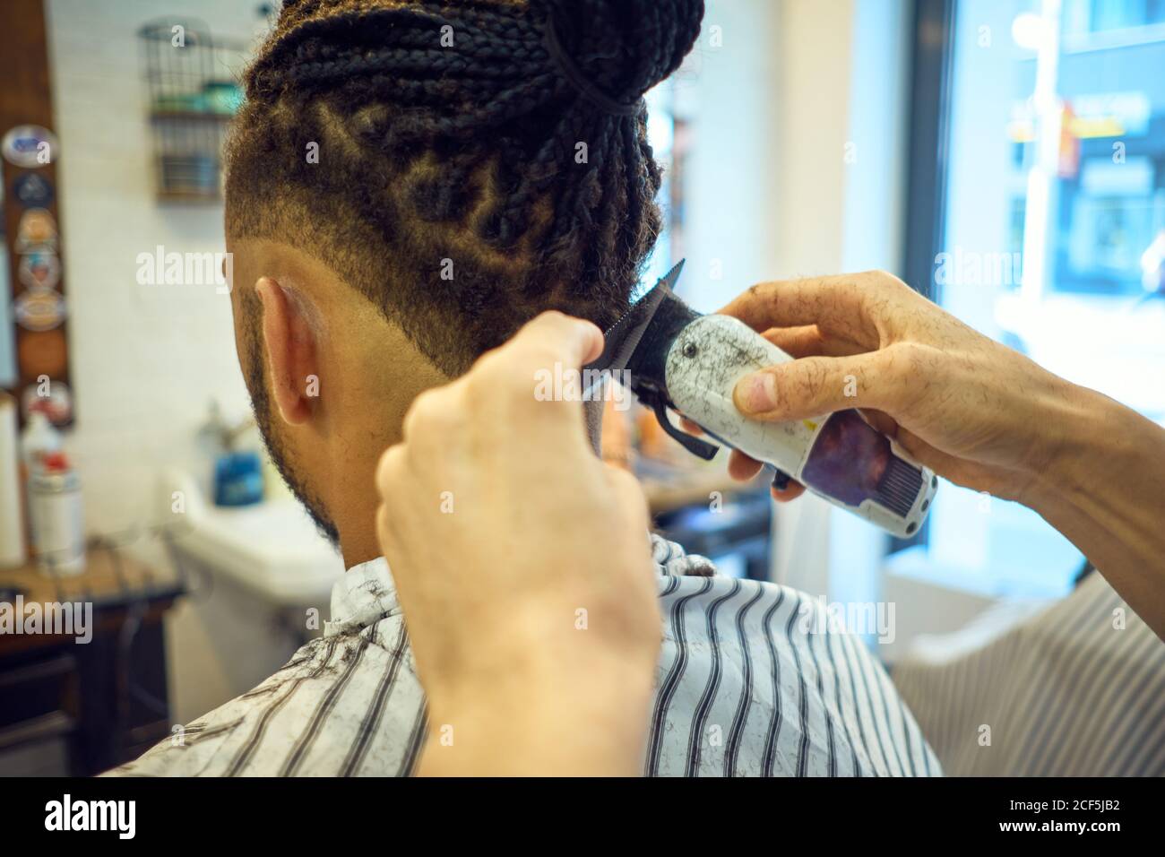 Back view african man doing hi-res stock photography and images - Alamy