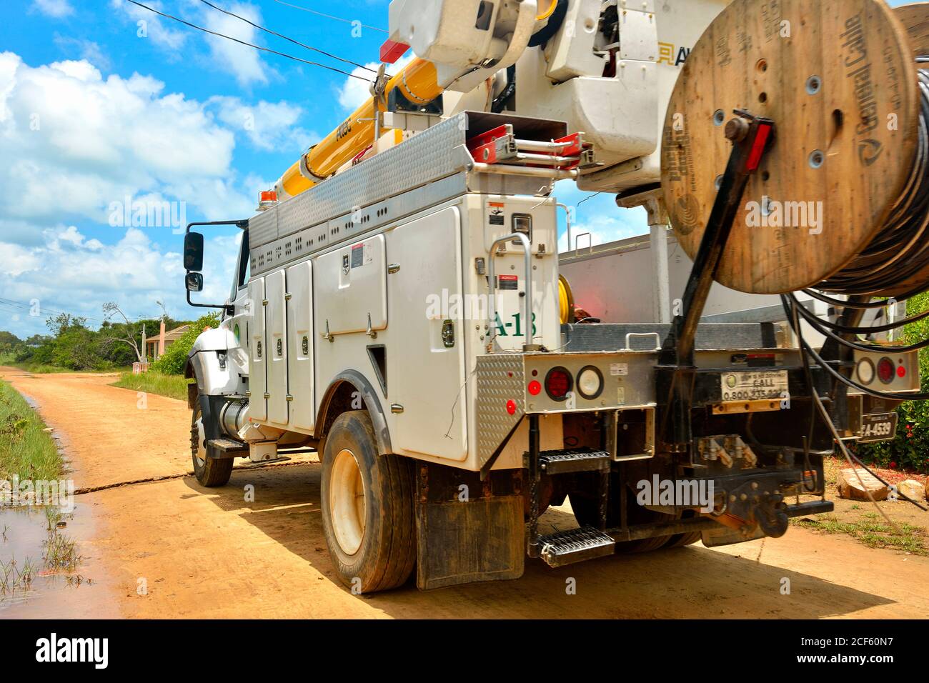 Sittee Point, Stann Creek District, Belize - September 03, 2020: Belize Elictricity Limited truck drives though Sittee Point while conducting a damage assessment in the aftermath of hurricane NaNa Stock Photo